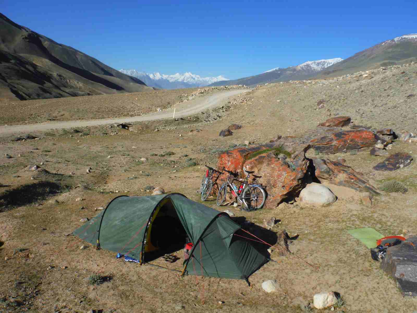 setting up camp at altitude on the pamir highway