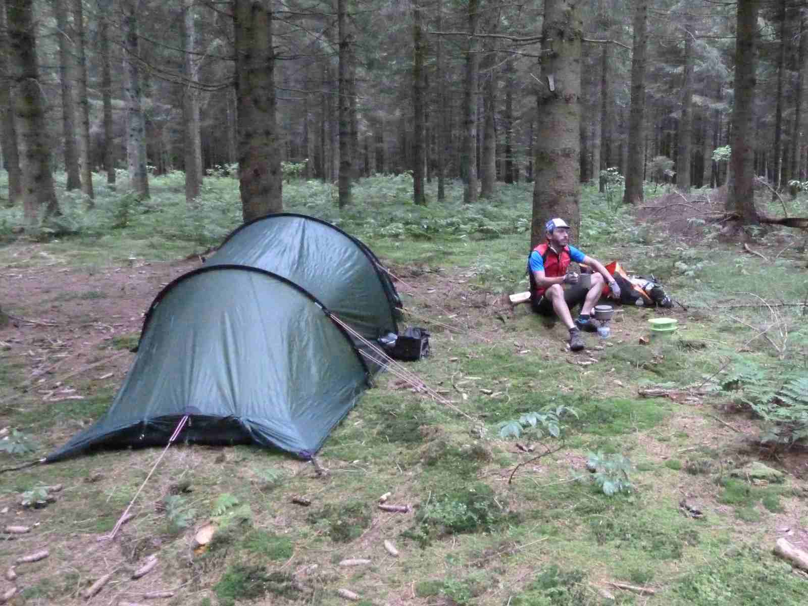 breaking a wild camp in the Black Forest with a cup or tea and a bowl of porridge