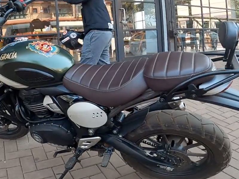 rear profile of the 400x triumph scrambler outside the provorim showroom in goa